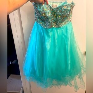 Beautiful ruffled sea foam beaded cocktail semi formal quincenera dress.